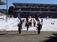 Marching through stadium in Grand Parade